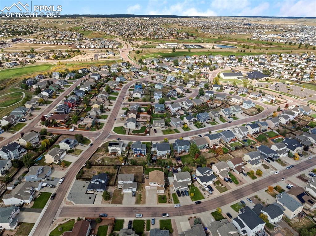 12210 Crystal Downs Road Peyton, CO 80831 - Photo 47 of 50 Aerial view of property and surrounding area featuring nearby suburban area