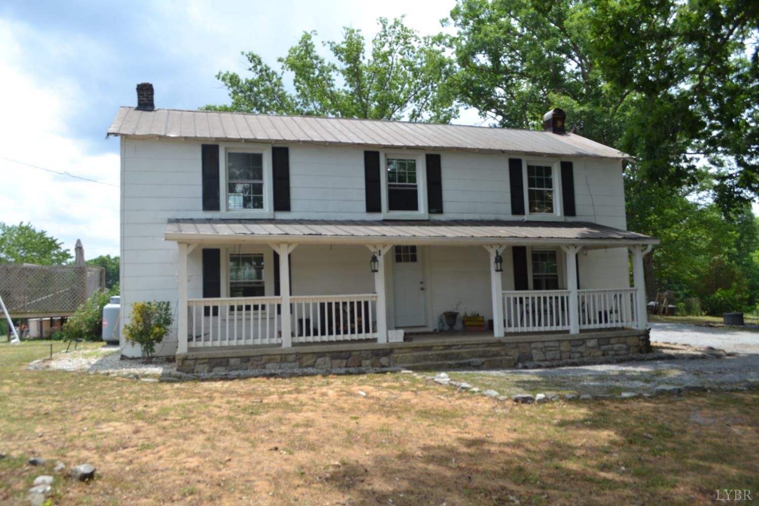 6387 Red House Road Rustburg, VA 24588 - Photo 5 of 38 a front view of a house with a yard