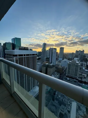 a view of roof deck with city view