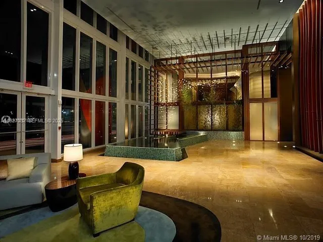 a view of a living room and window