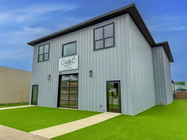 a backyard of a house with oven