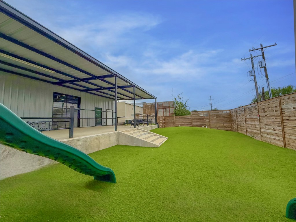617 Main Street Lexington, TX 78947 - Photo 2 of 25 View of yard featuring fence and a patio area