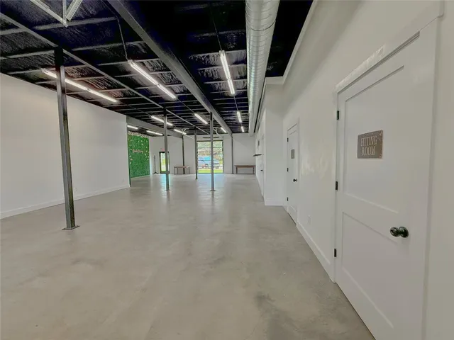 a view of hallway with stairs