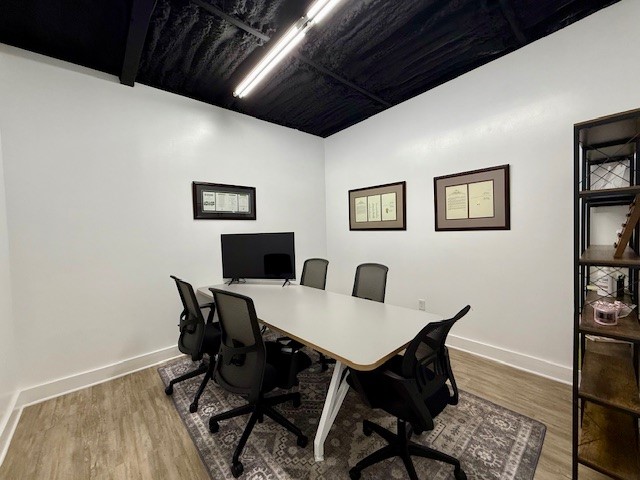 617 Main Street Lexington, TX 78947 - Photo 9 of 25 Office area featuring baseboards and vinyl plank floors