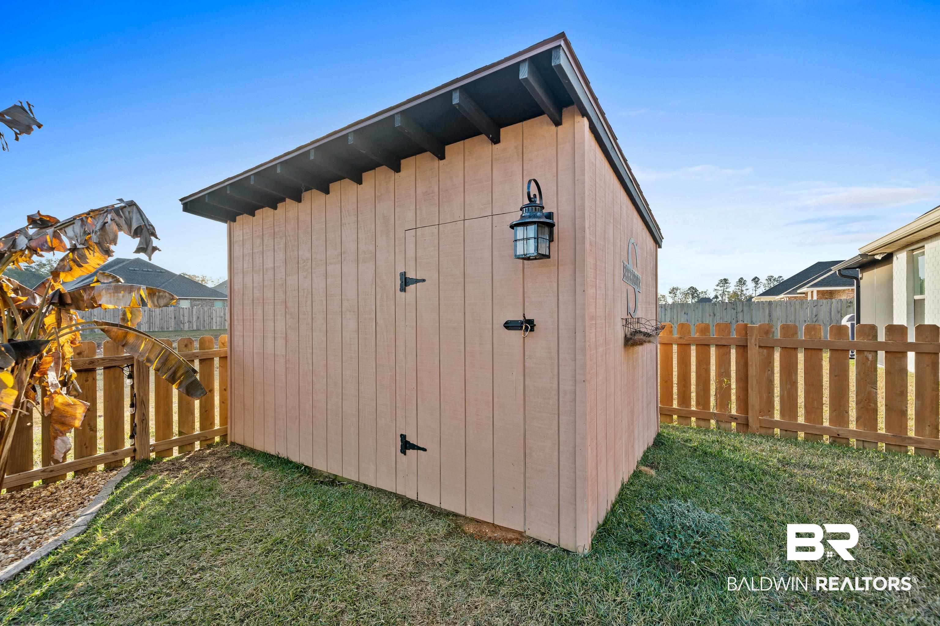 1390 Aldon Street Foley, AL 36535 - Photo 28 of 31 View of shed featuring a fenced backyard