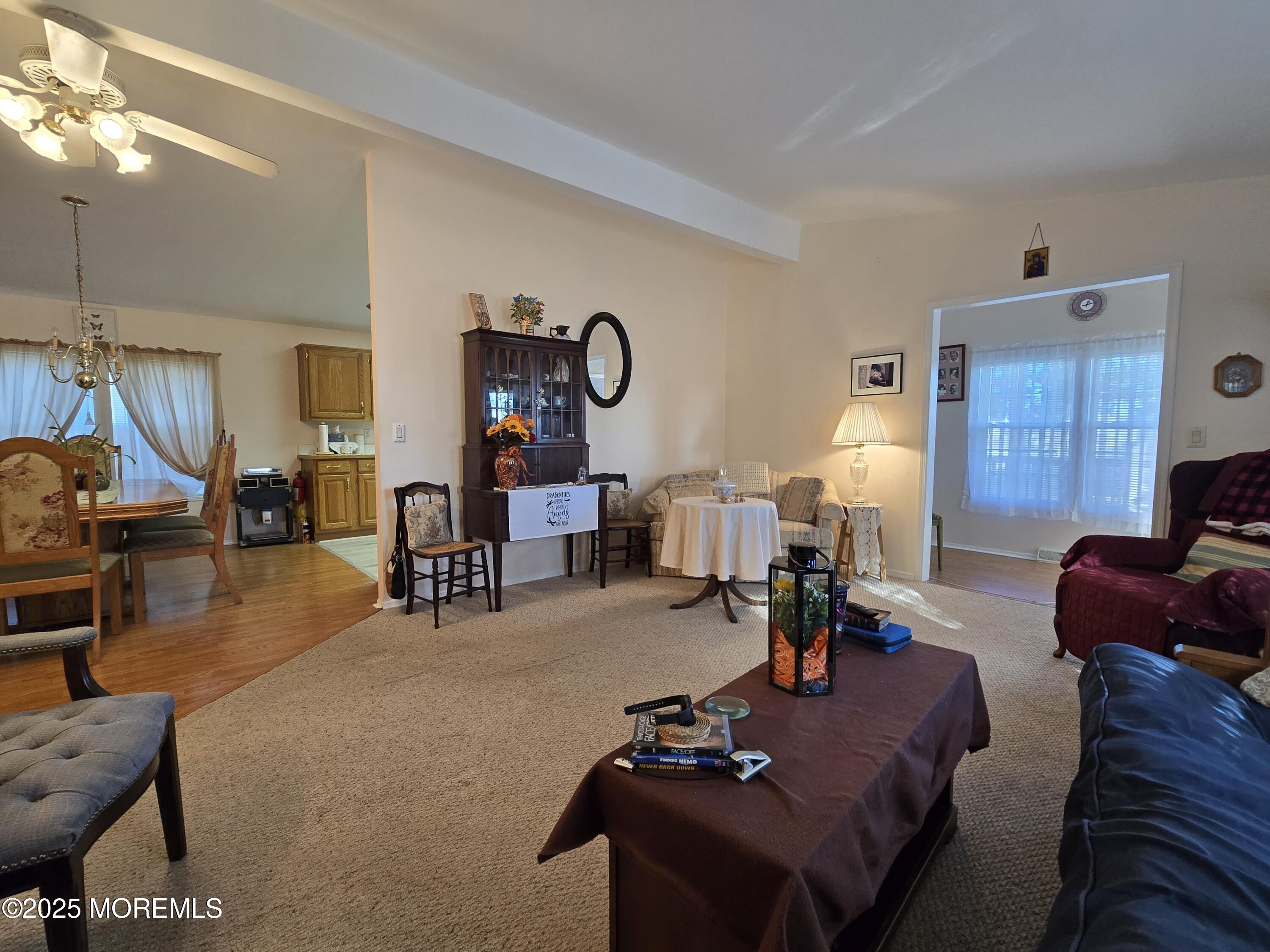 98 Woody Road Freehold, NJ 07728 - Photo 13 of 37 a living room with furniture and wooden floor