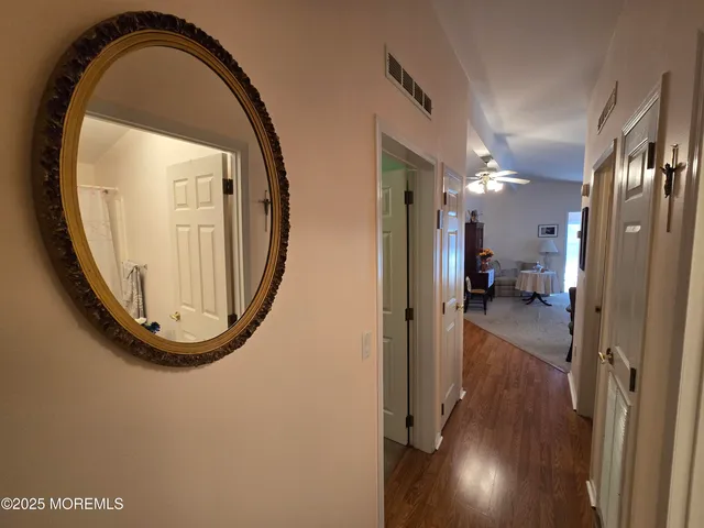 a view of a livingroom from a corridor