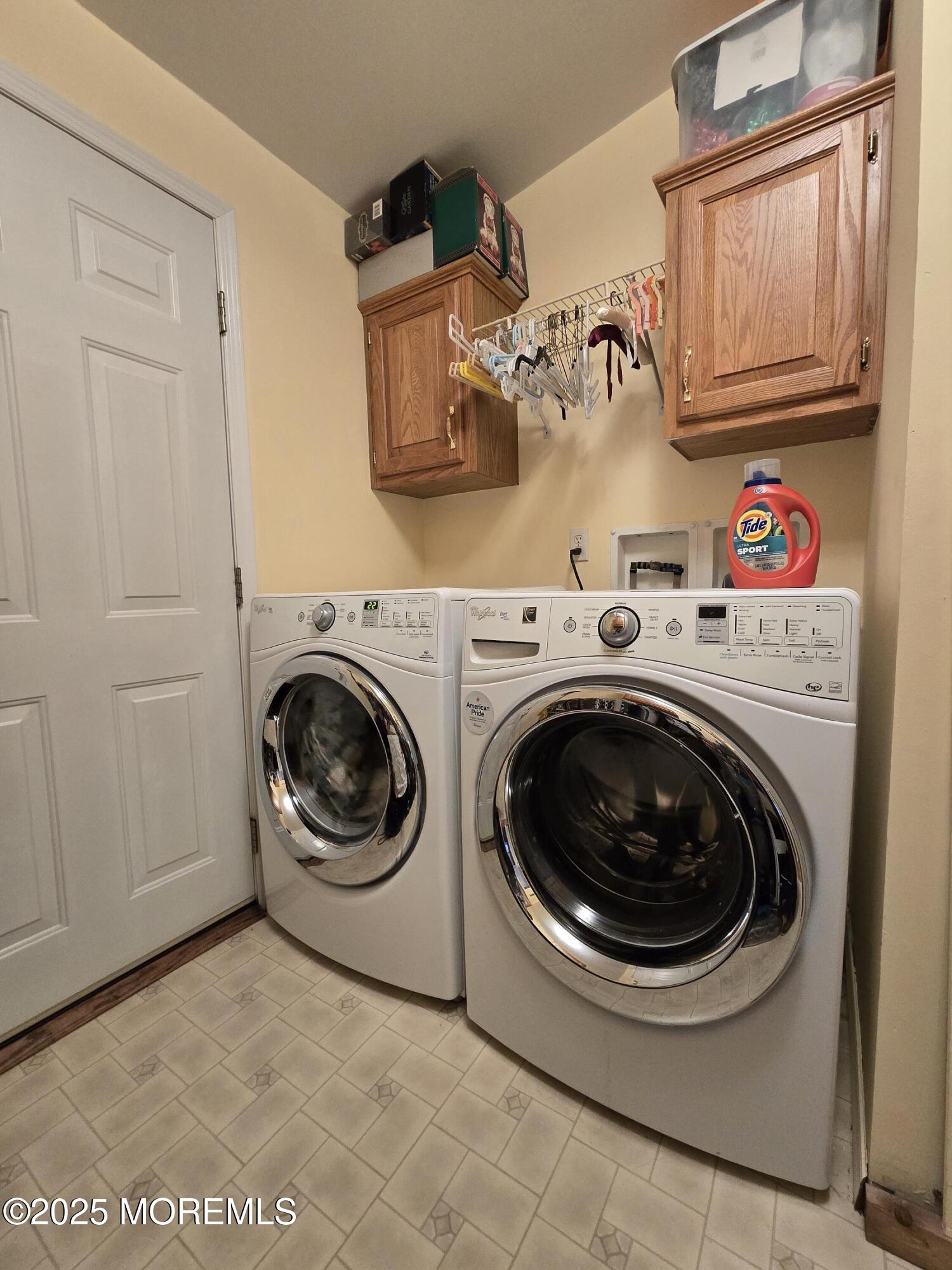 98 Woody Road Freehold, NJ 07728 - Photo 26 of 37 a utility room with dryer and washer