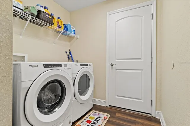 a utility room with dryer and washer