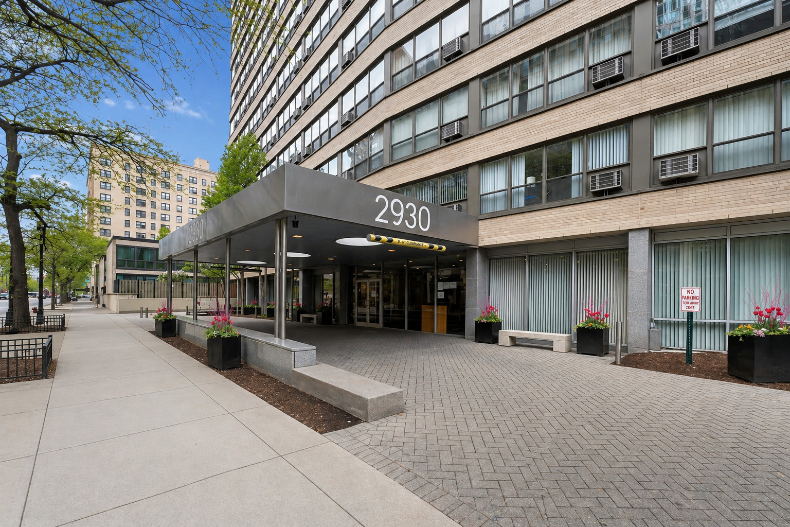 2930 North Sheridan Road, Unit 1301 Chicago, IL 60657 - Photo 2 of 27 a view of a building with a street