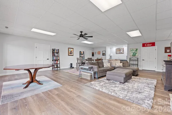 a living room with furniture and a rug