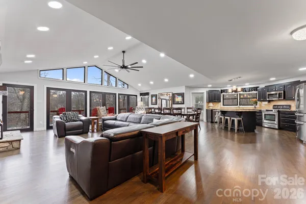 a living room with furniture and a table