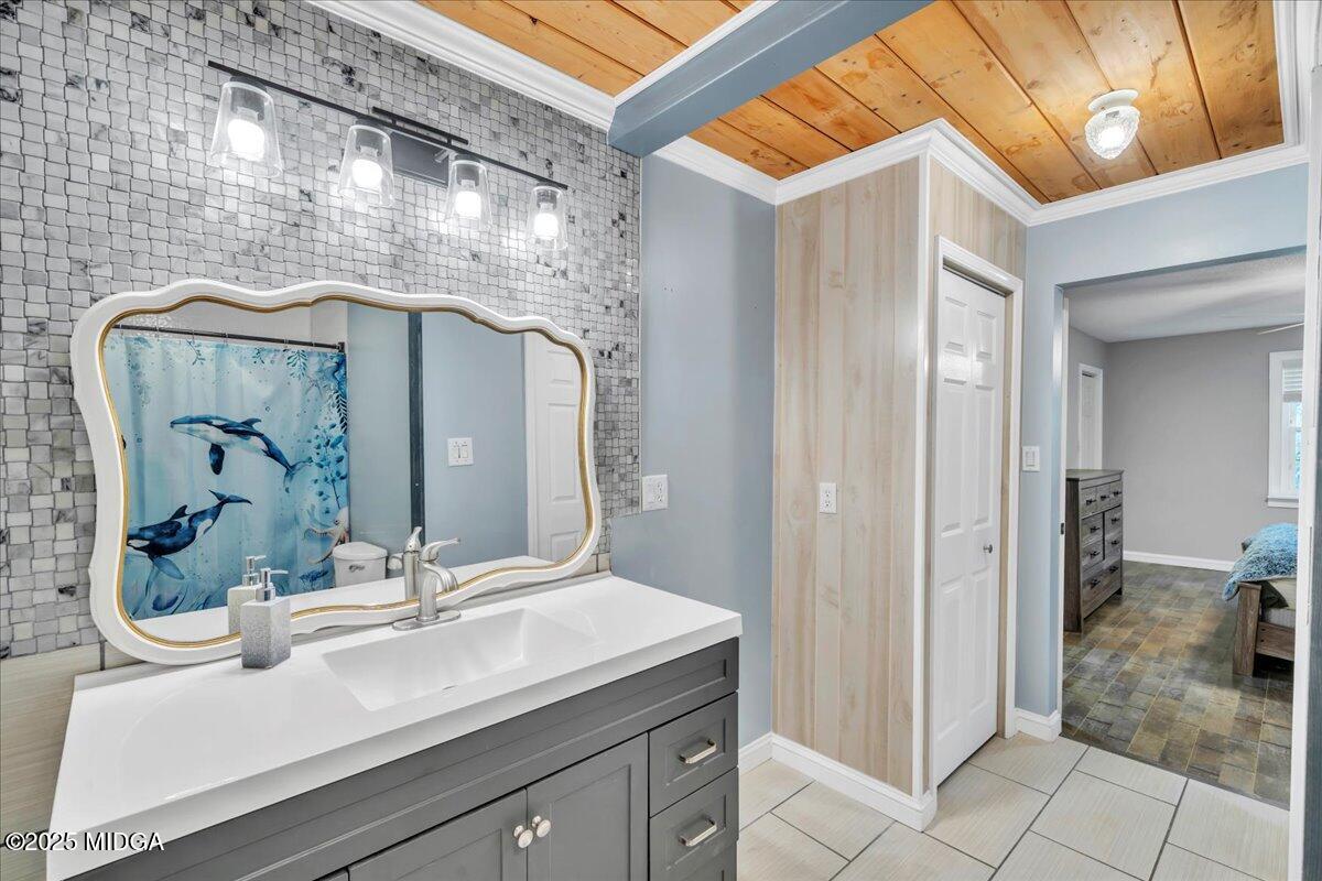 354 Pineview Road Gray, GA 31032 - Photo 24 of 44 a bathroom with a sink and a mirror