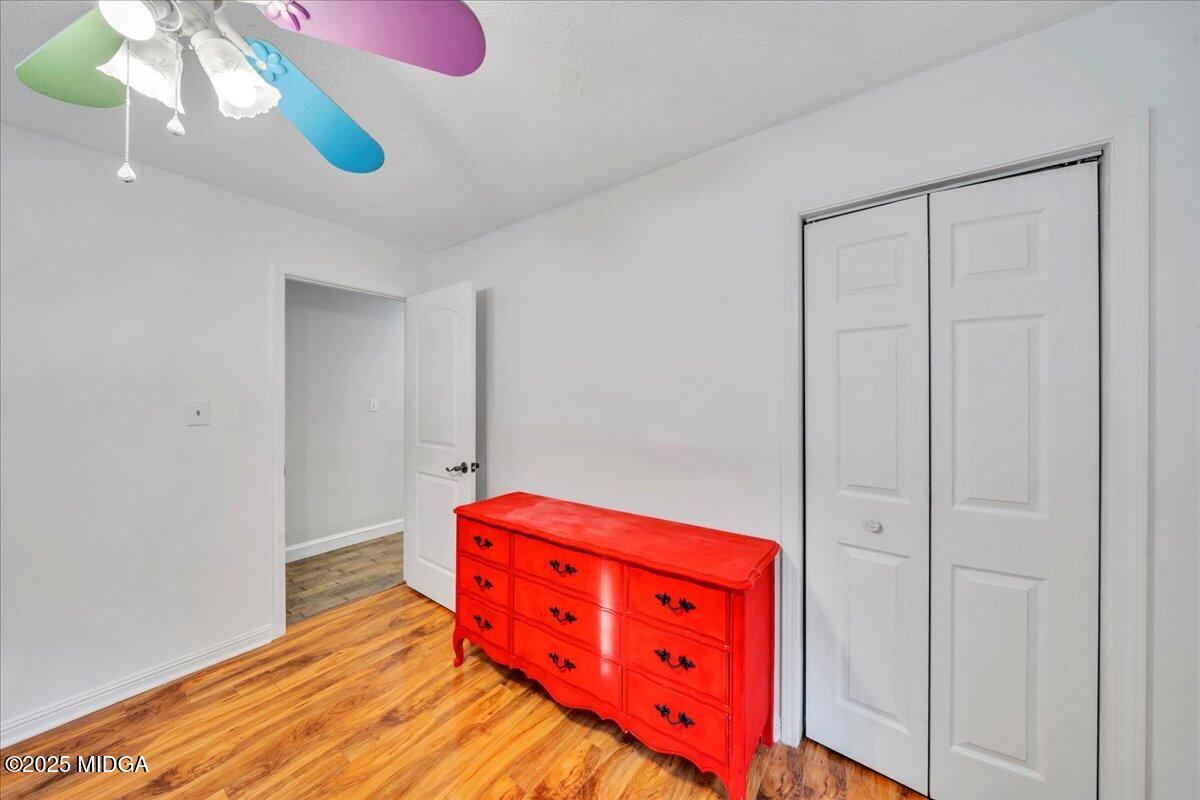 354 Pineview Road Gray, GA 31032 - Photo 26 of 44 a bedroom with a bed and a dresser