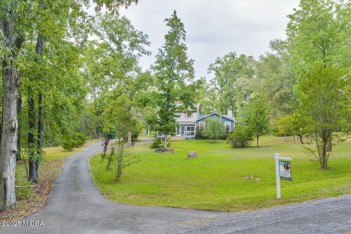 354 Pineview Road Gray, GA 31032 - Photo 3 of 44 a front view of a house with a yard