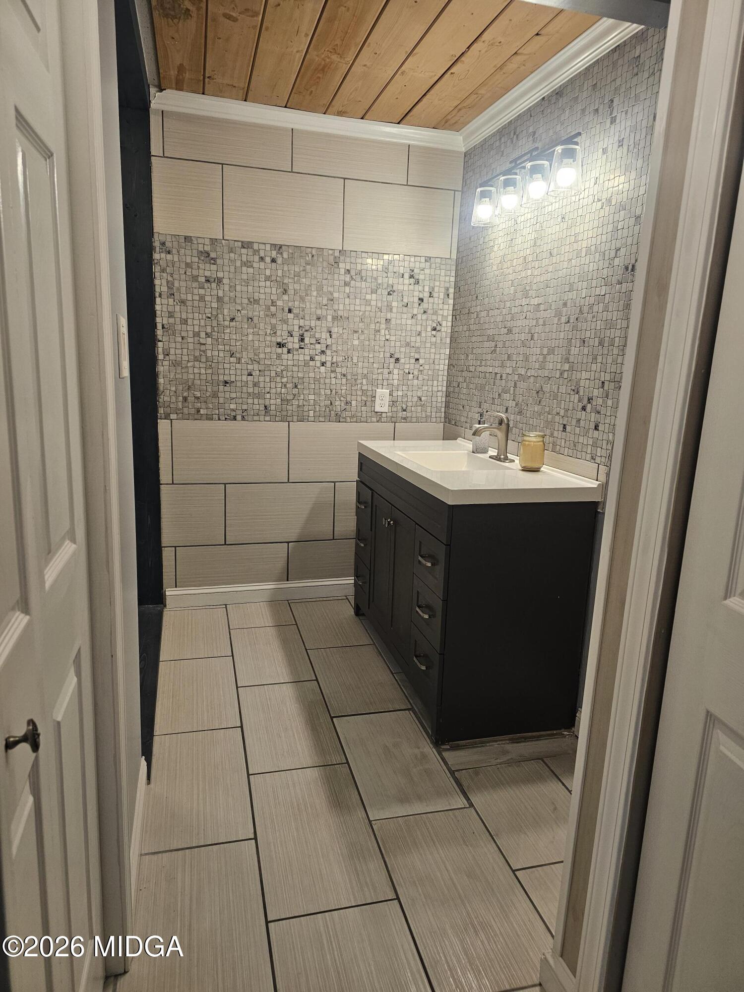 354 Pineview Road Gray, GA 31032 - Photo 38 of 44 a bathroom with a sink and mirror