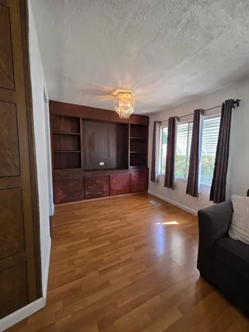 a view of livingroom with furniture and window