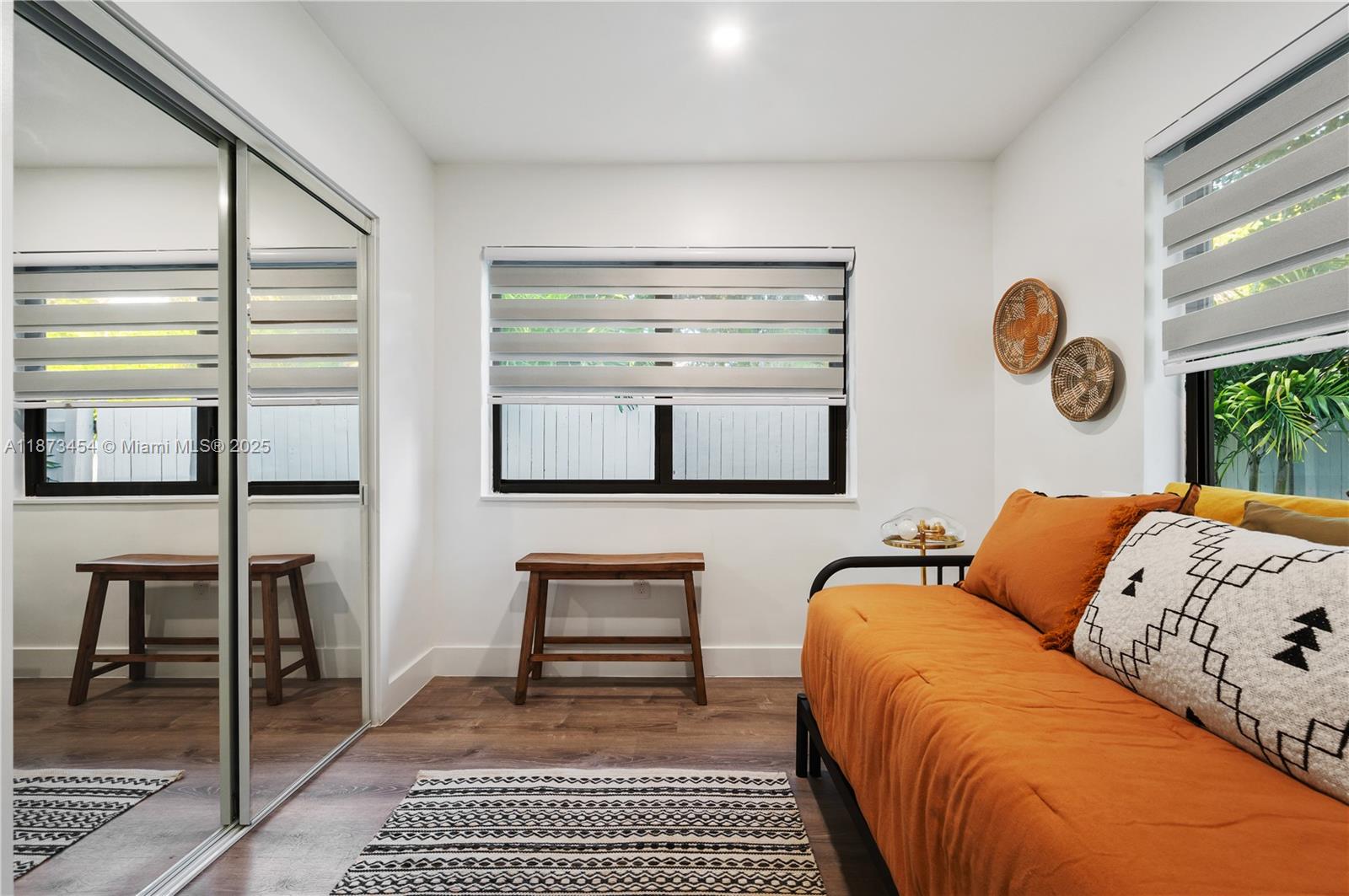 2917 Center Street Miami, FL 33133 - Photo 23 of 32 a bedroom with furniture and a window