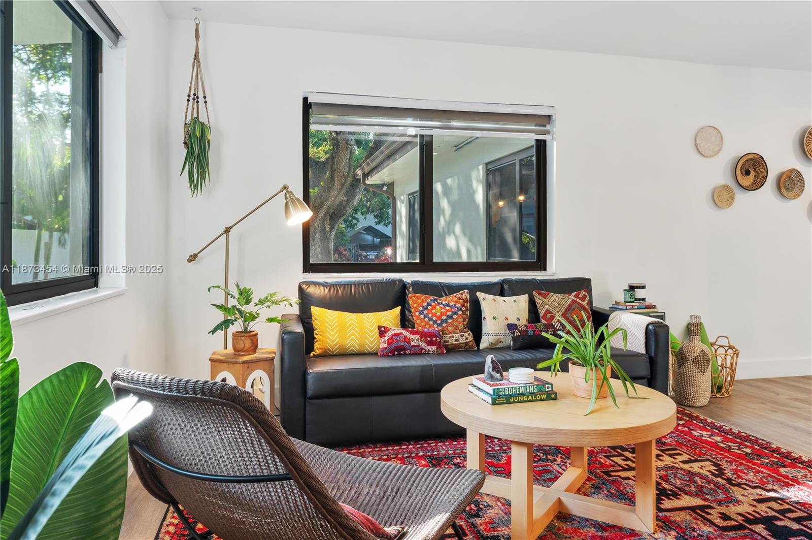 2917 Center Street Miami, FL 33133 - Photo 4 of 32 a living room with furniture and a potted plant