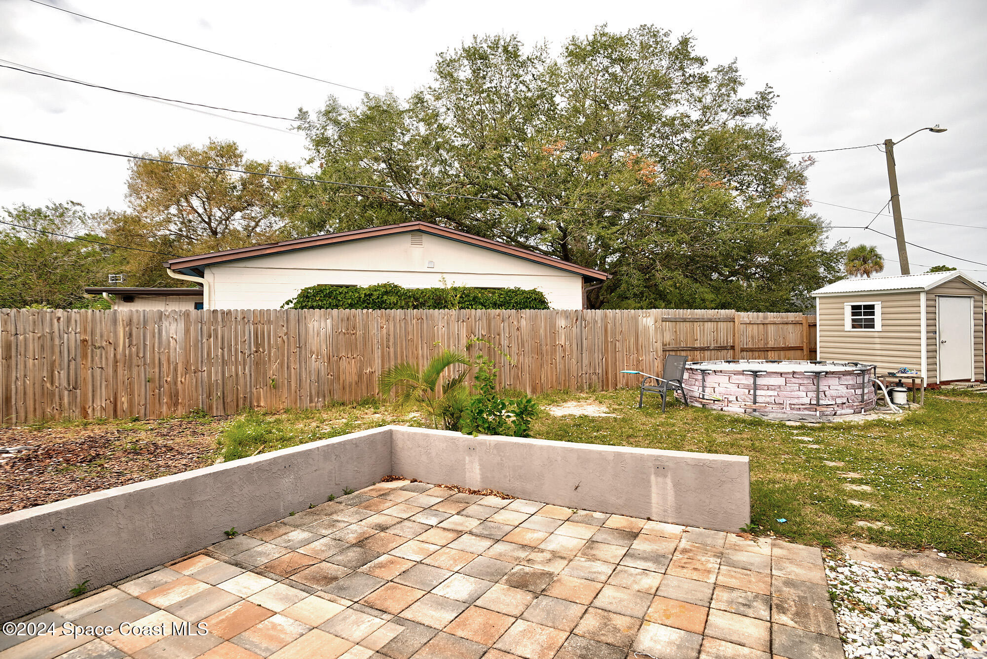 28 West Azalea Circle Rockledge, FL 32955 - Photo 16 of 18 Back porch