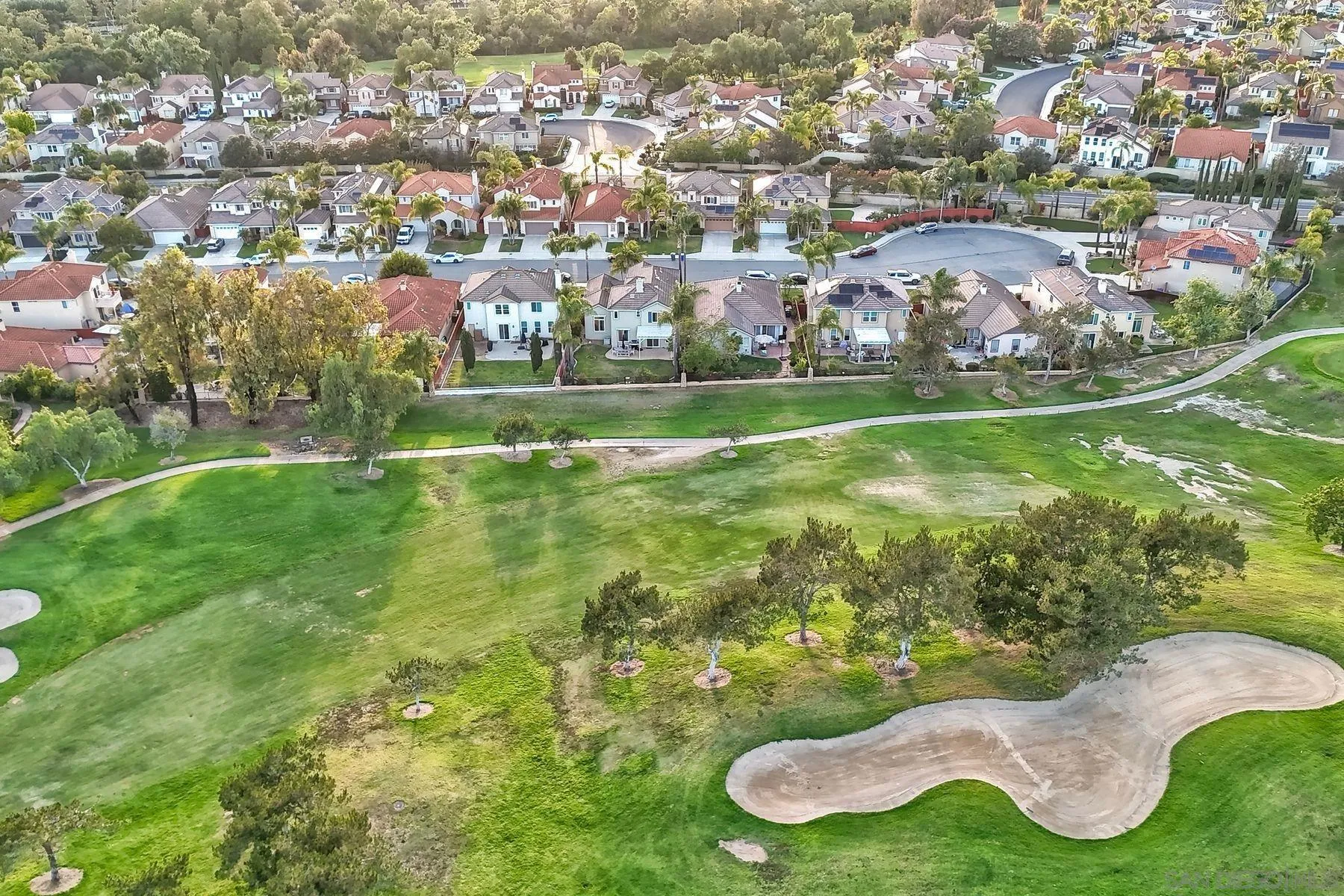 529 Peach Tree Way San Marcos, CA 92069 - Photo 29 of 30 a view of a lake with a building in the background