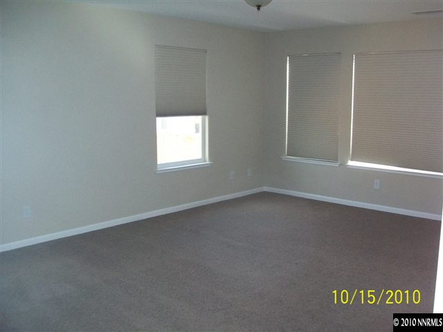 460 Teramo Court Reno, NV 89521 - Photo 5 of 13 an empty room with a window