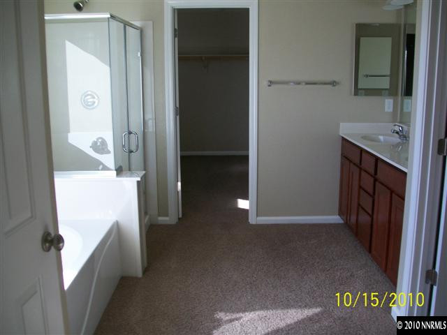 460 Teramo Court Reno, NV 89521 - Photo 6 of 13 a view of a hallway with washer and dryer