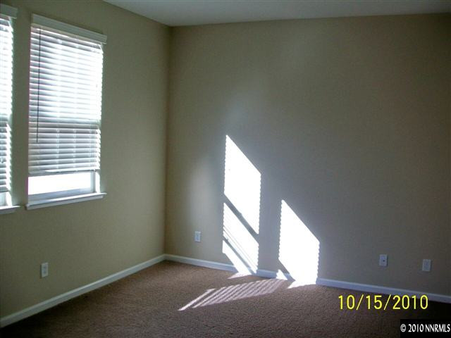 460 Teramo Court Reno, NV 89521 - Photo 7 of 13 a view of an empty room and window