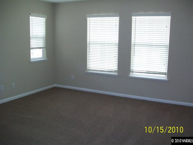 460 Teramo Court Reno, NV 89521 - Photo 8 of 13 an empty room with a window