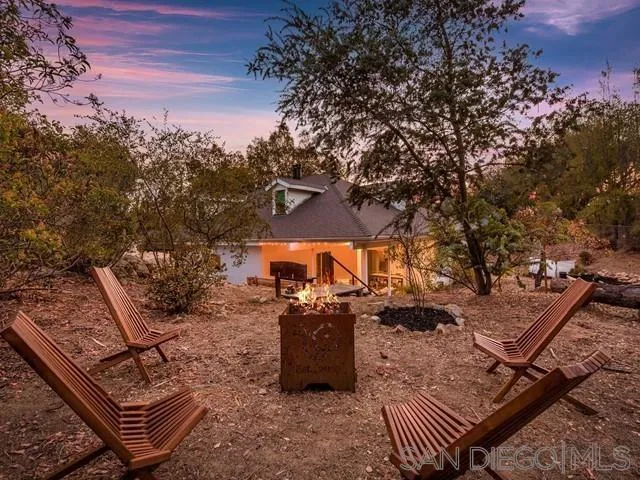 an outdoor space with patio furniture