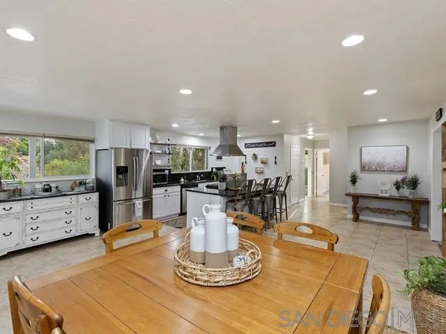 6460 Rainbow Heights Road Fallbrook, CA 92028 - Photo 13 of 38 a living room with furniture and kitchen view