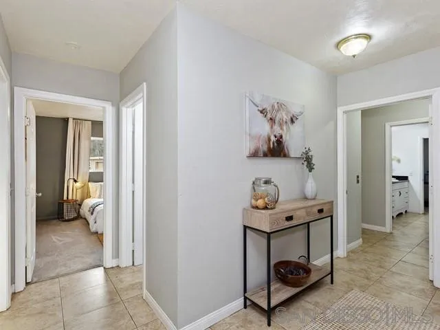 6460 Rainbow Heights Road Fallbrook, CA 92028 - Photo 18 of 38 a room that has a table and a chair in it