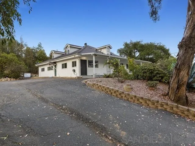 6460 Rainbow Heights Road Fallbrook, CA 92028 - Photo 37 of 38 a front view of a house with a yard