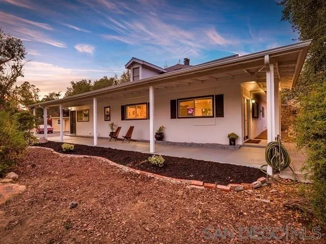 6460 Rainbow Heights Road Fallbrook, CA 92028 - Photo 4 of 38 a front view of a house with garden