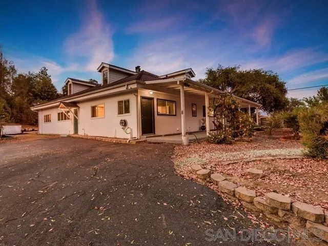 6460 Rainbow Heights Road Fallbrook, CA 92028 - Photo 5 of 38 a view of a house with a yard