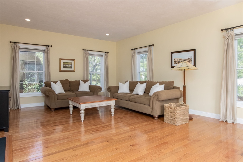256 Lowell Road Groton, MA 01450 - Photo 15 of 40 a living room with furniture and a window