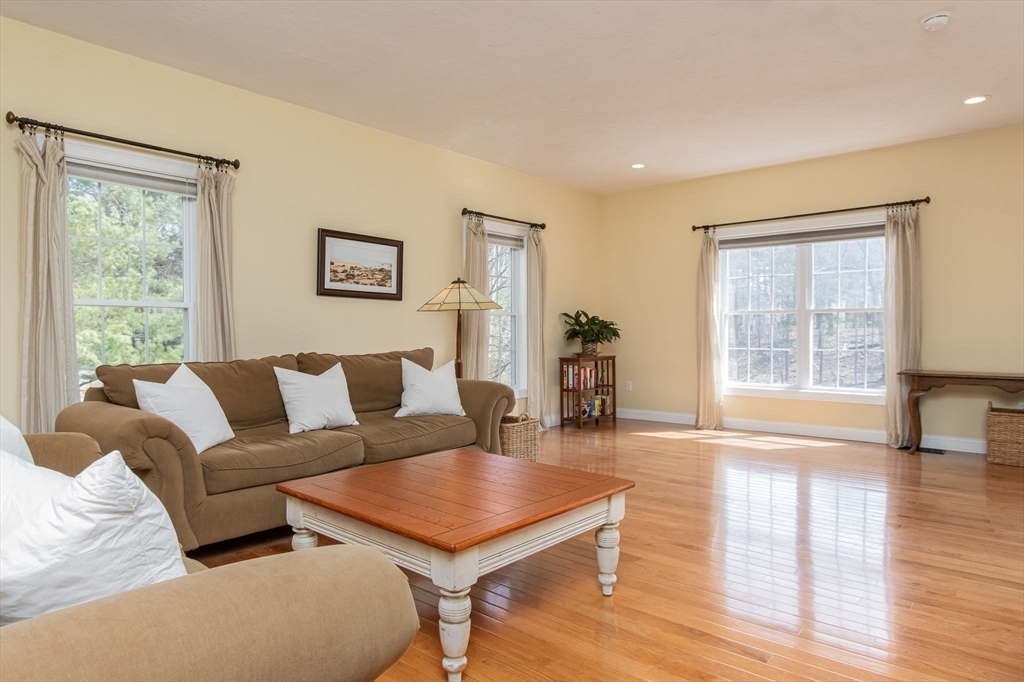 256 Lowell Road Groton, MA 01450 - Photo 16 of 40 a living room with furniture and a window