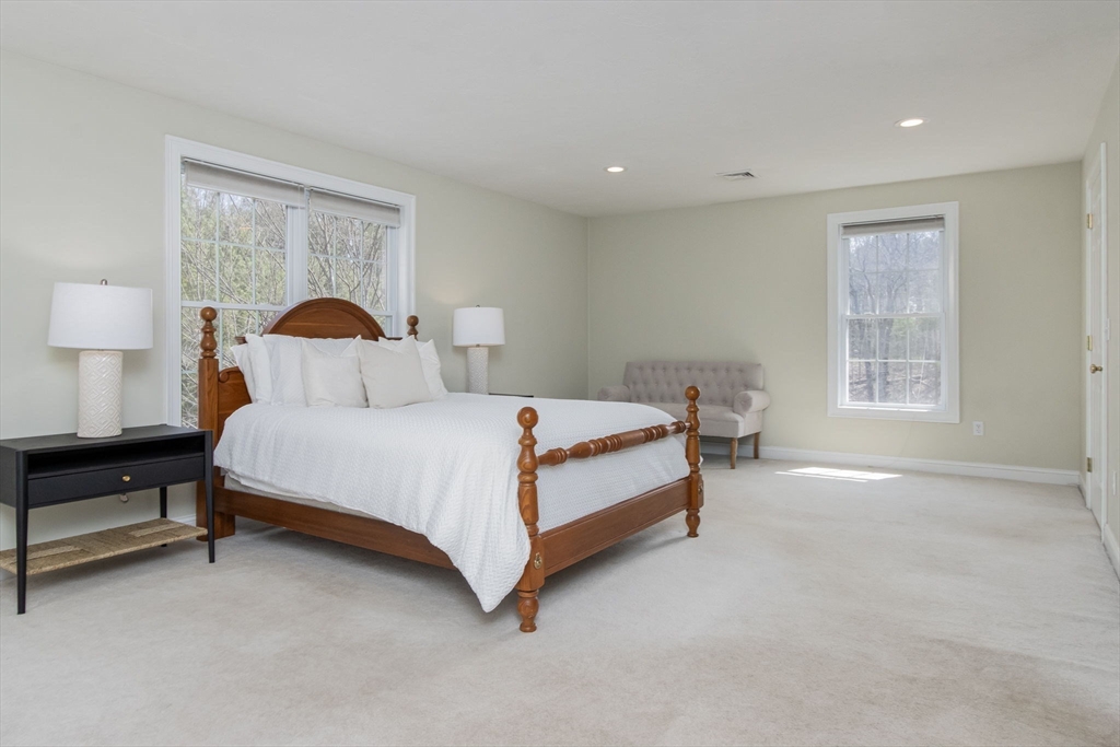 256 Lowell Road Groton, MA 01450 - Photo 21 of 40 a bedroom with a bed and a window