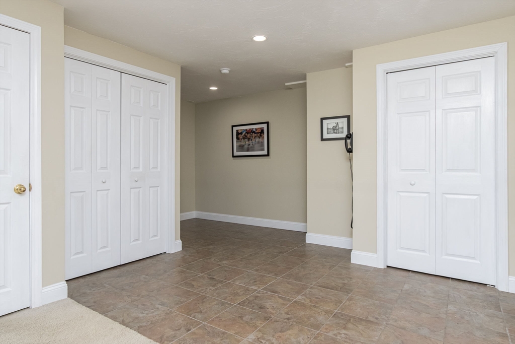 256 Lowell Road Groton, MA 01450 - Photo 30 of 40 an empty room with closet area