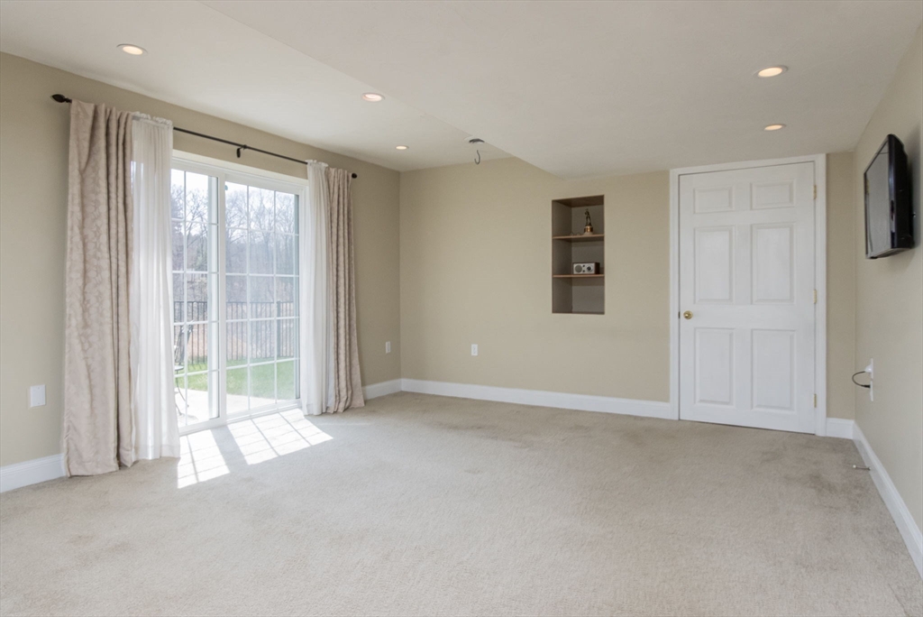 256 Lowell Road Groton, MA 01450 - Photo 31 of 40 a view of an empty room with a window