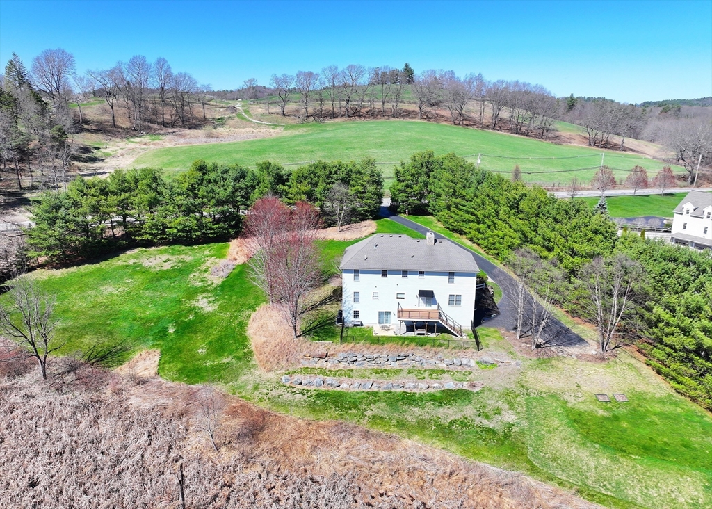 256 Lowell Road Groton, MA 01450 - Photo 35 of 40 an aerial view of a house with big yard