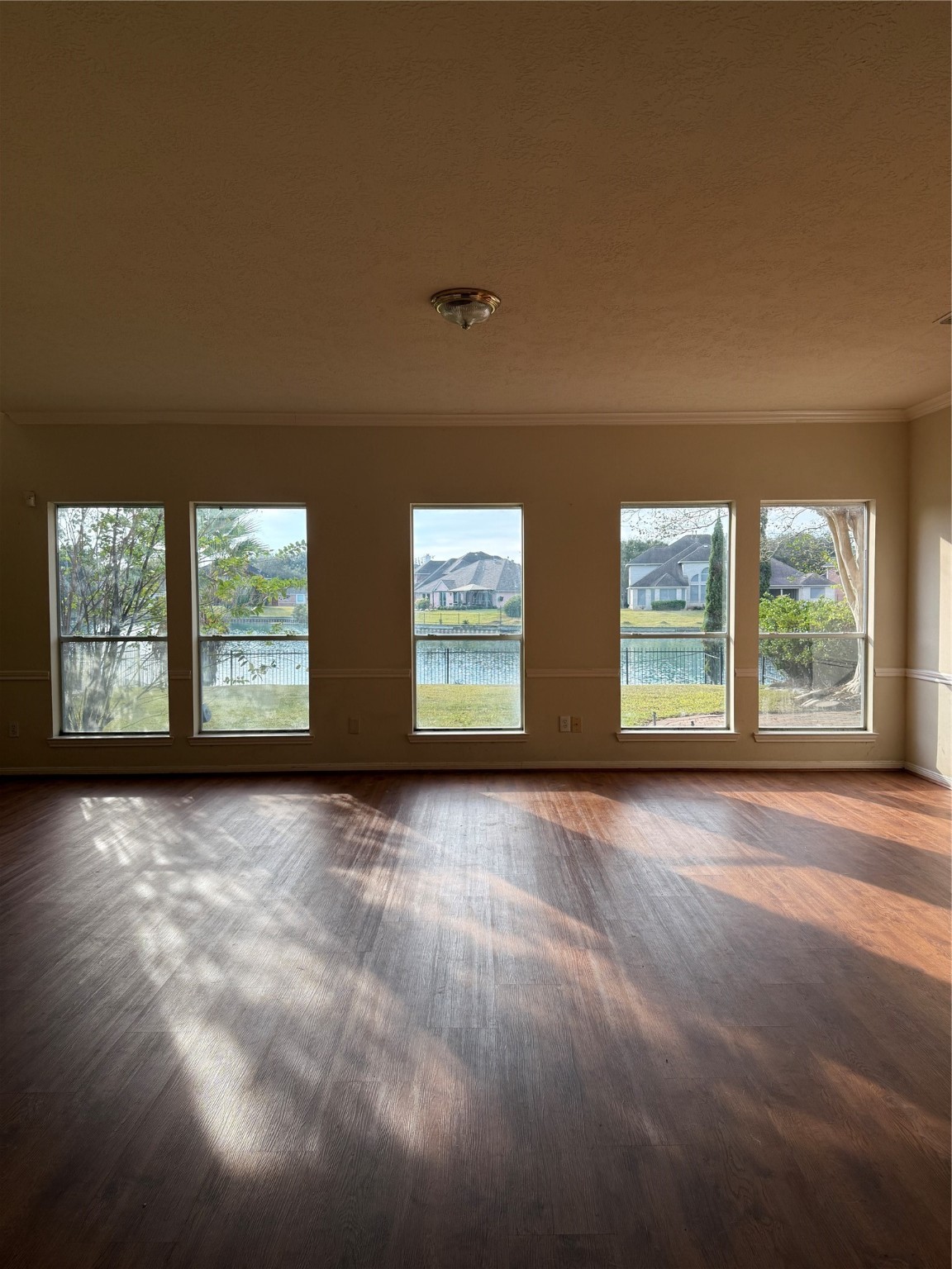 6714 Portuguese Bend Drive Missouri City, TX 77459 - Photo 2 of 13 a view of an empty room with windows and balcony