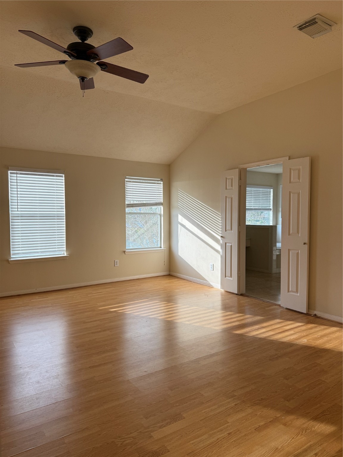 6714 Portuguese Bend Drive Missouri City, TX 77459 - Photo 6 of 13 a view of empty room with wooden floor and fan