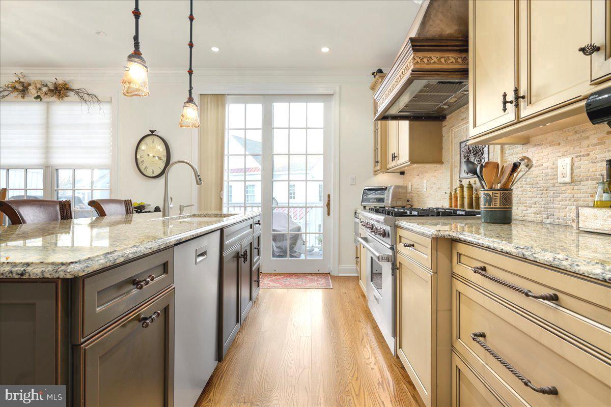 36 West Mechanic Street New Hope, PA 18938 - Photo 11 of 26 a large kitchen with granite countertop a large stove a sink and a dishwasher