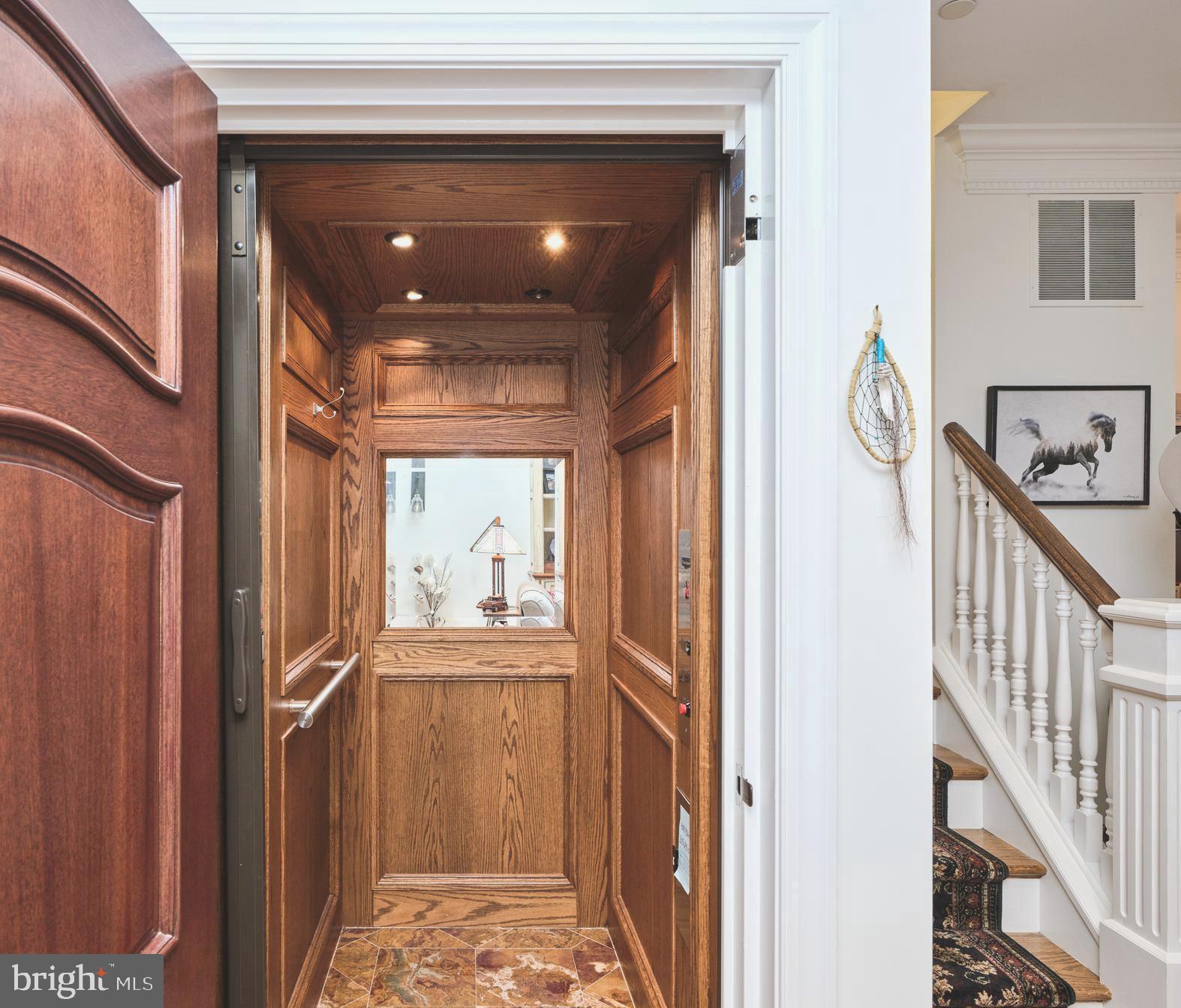 36 West Mechanic Street New Hope, PA 18938 - Photo 14 of 26 a view of a hallway with wooden floor and windows