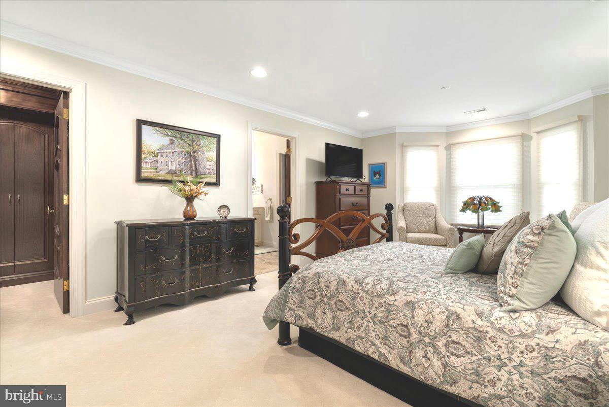 36 West Mechanic Street New Hope, PA 18938 - Photo 16 of 26 a bedroom with a bed a table and chair