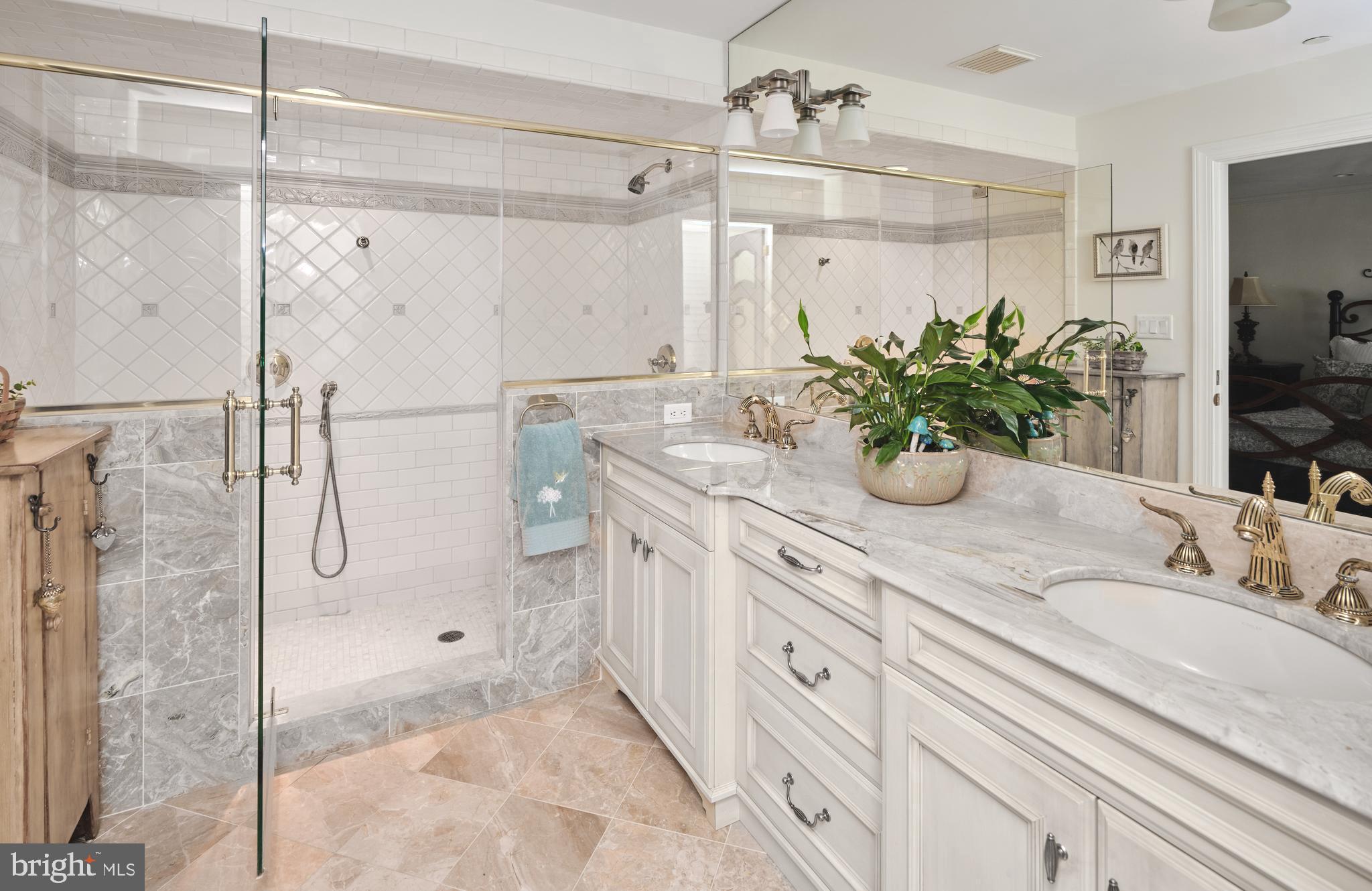 36 West Mechanic Street New Hope, PA 18938 - Photo 17 of 26 a bathroom with a double vanity sink mirror and shower