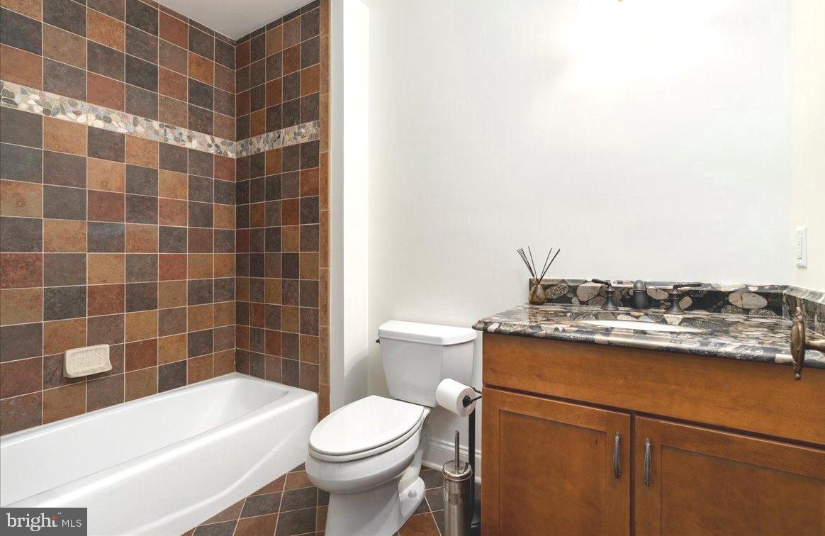 36 West Mechanic Street New Hope, PA 18938 - Photo 22 of 26 a bathroom with a sink a toilet and shower