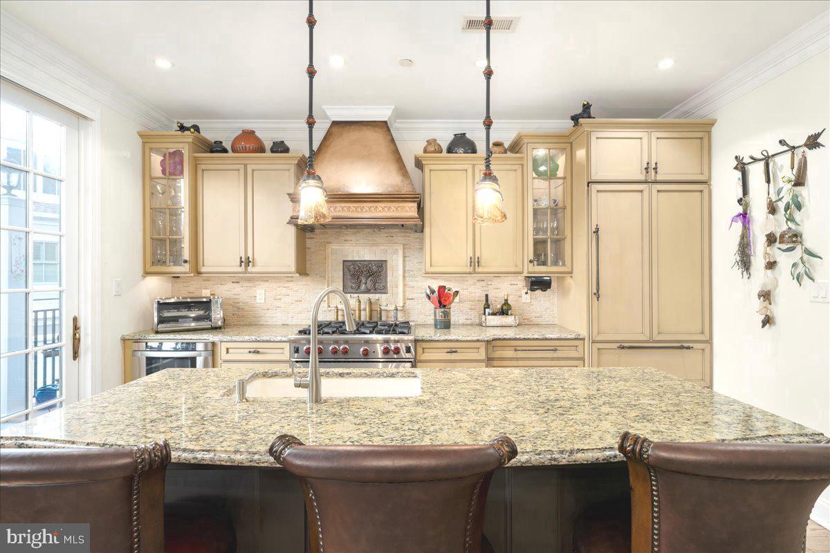 36 West Mechanic Street New Hope, PA 18938 - Photo 9 of 26 a kitchen with stainless steel appliances granite countertop a sink a stove and a refrigerator
