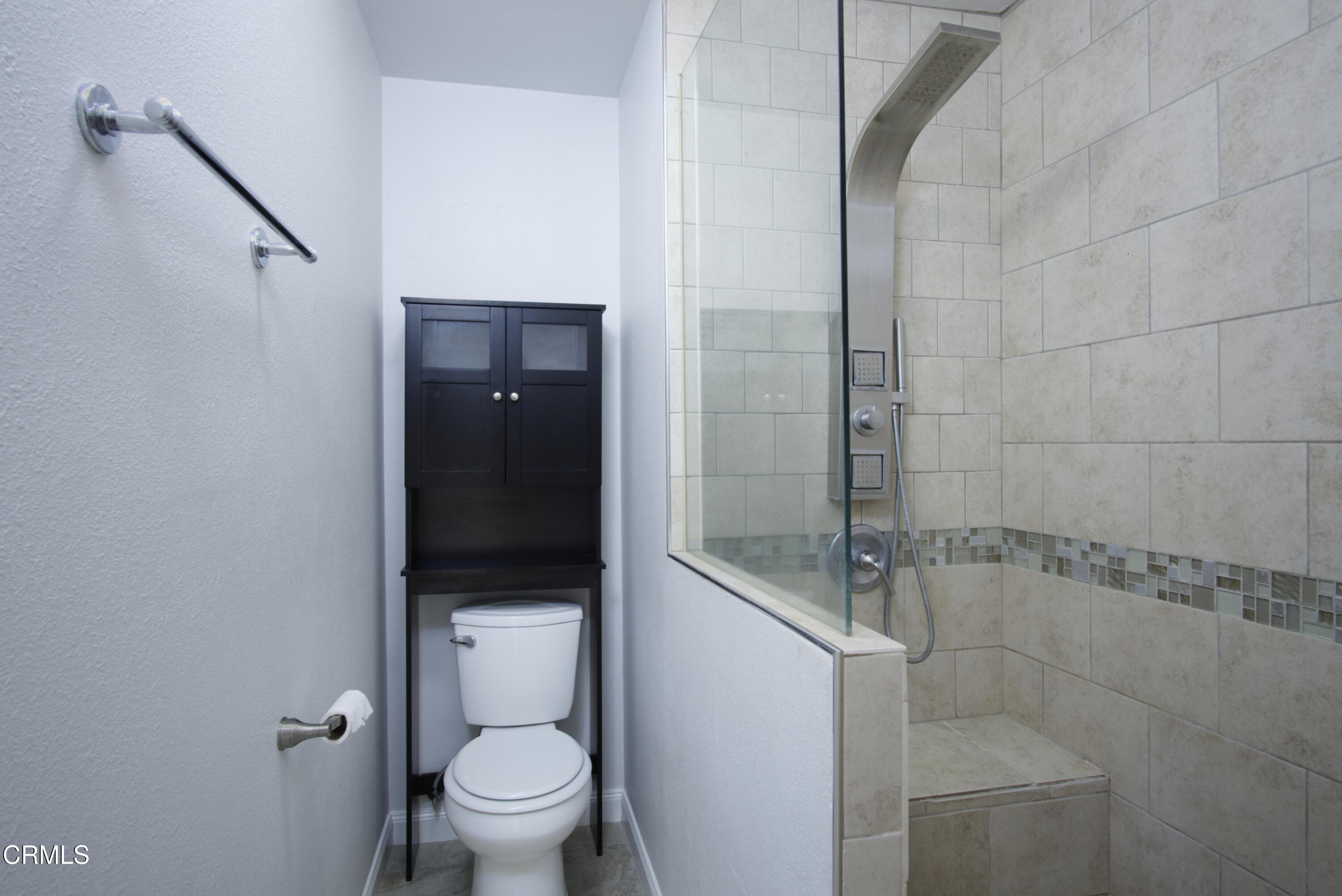 2121 Ironbark Drive Oxnard, CA 93036 - Photo 7 of 13 a bathroom with a granite countertop bathtub shower and toilet
